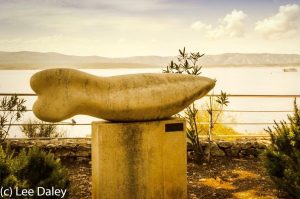 A sstone sculpture along a promenade near the village of Bol